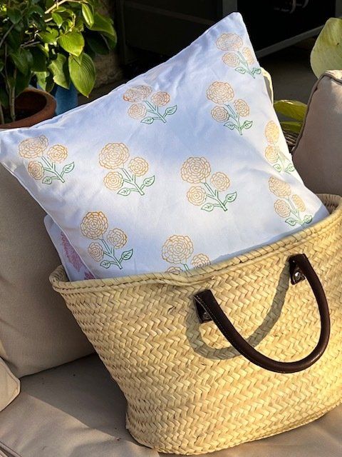 Block printed cushion in bag