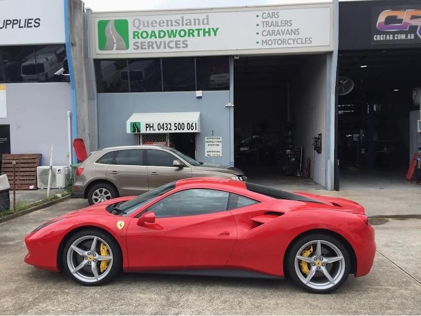 Sports Car and 4WD parked outside of Workshop — Queensland Roadworthy Services In Southport, QLD