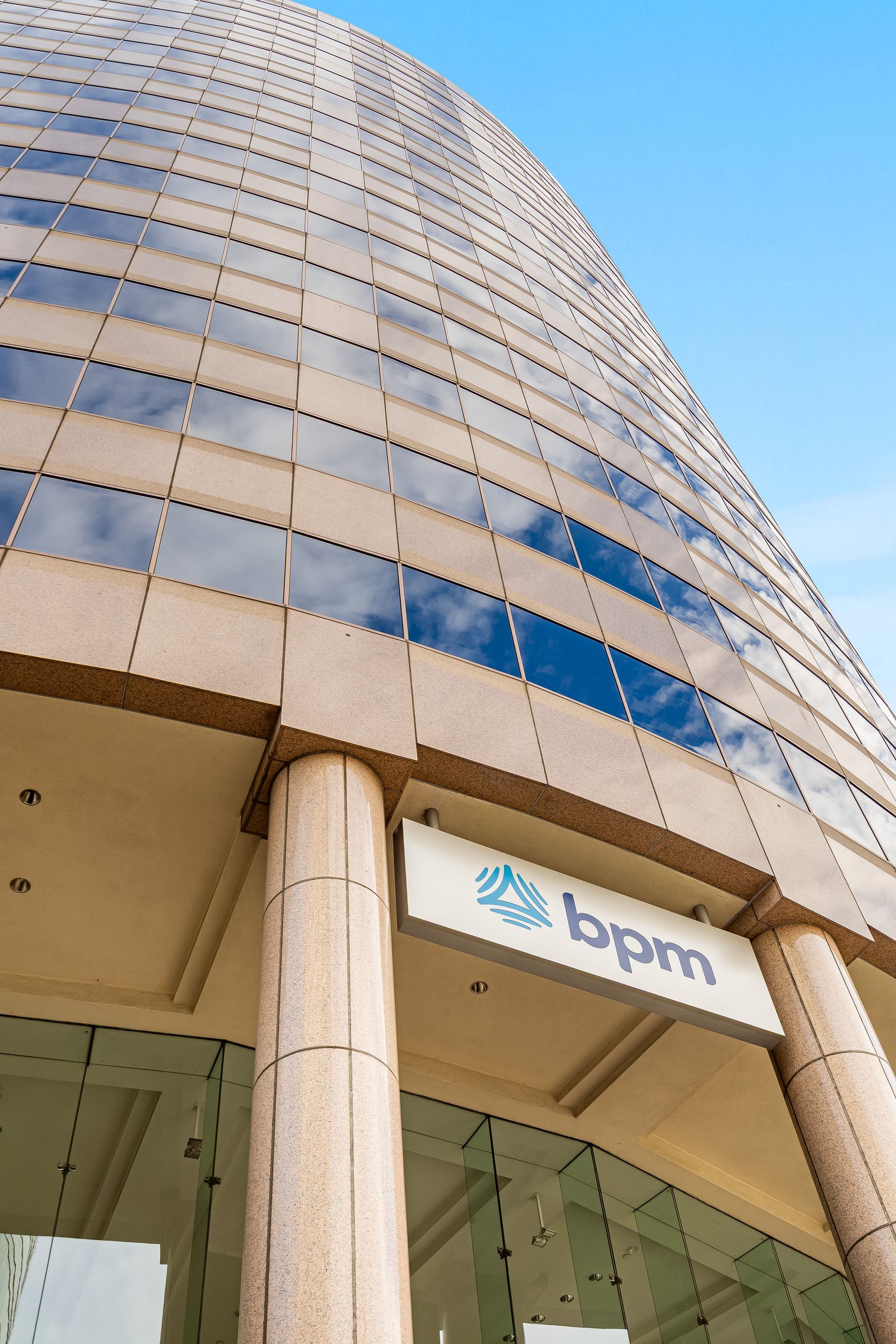 Tall glass skyscraper with 