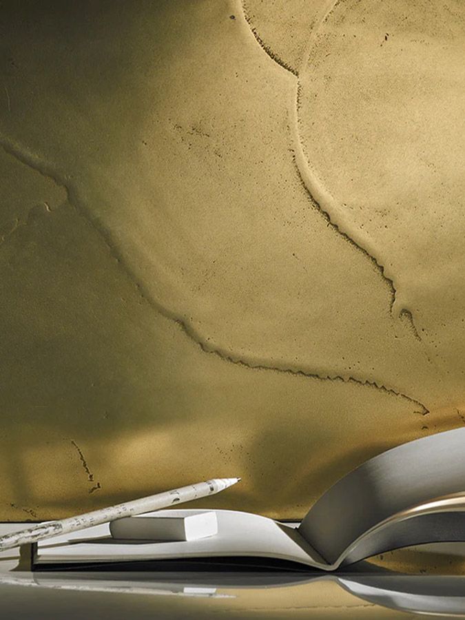 A pair of scissors sitting on top of an open book