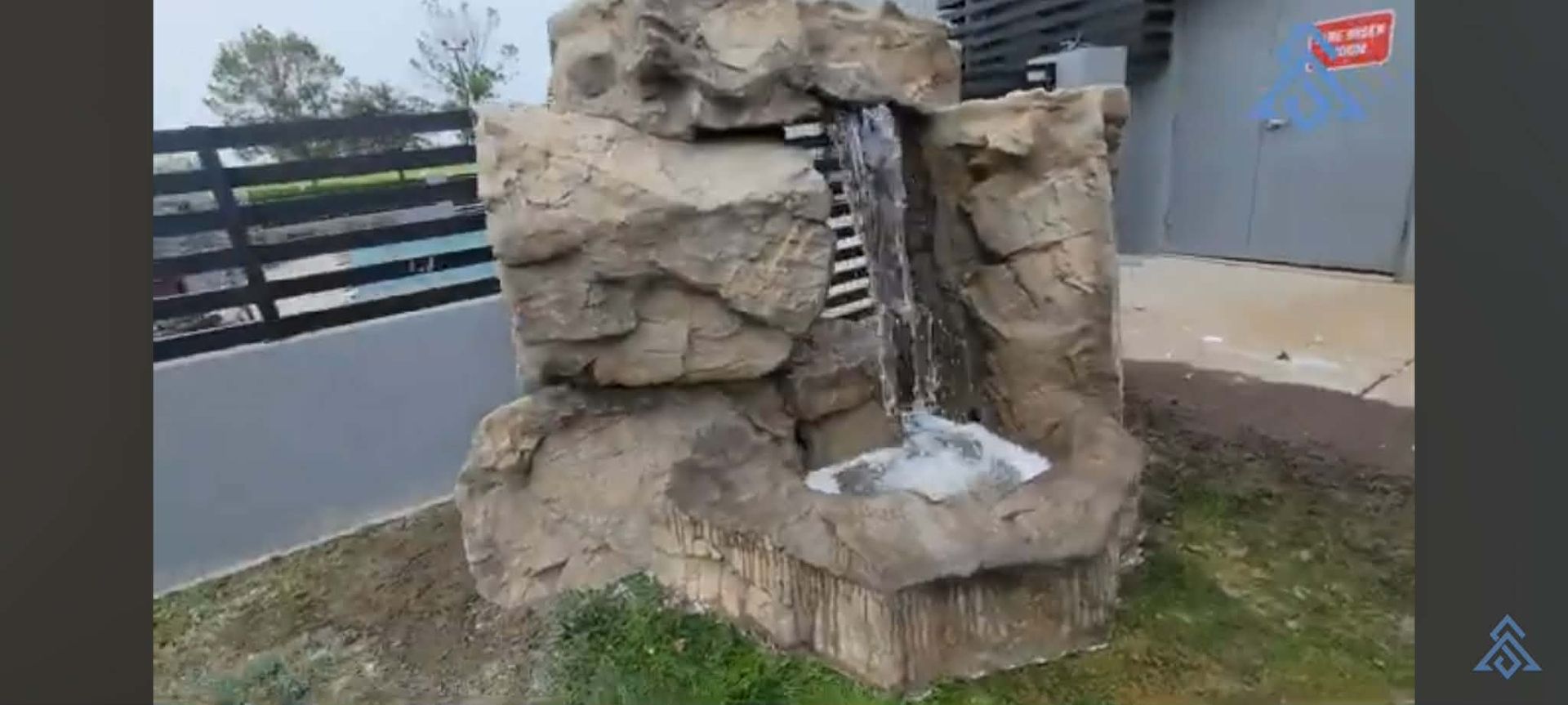 	
Custom 6×6 artificial rock waterfall installed in Kansas City
