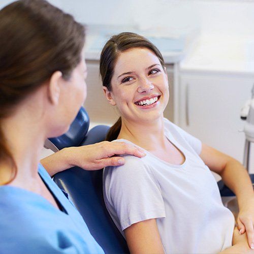 Dentist Counseling a patient