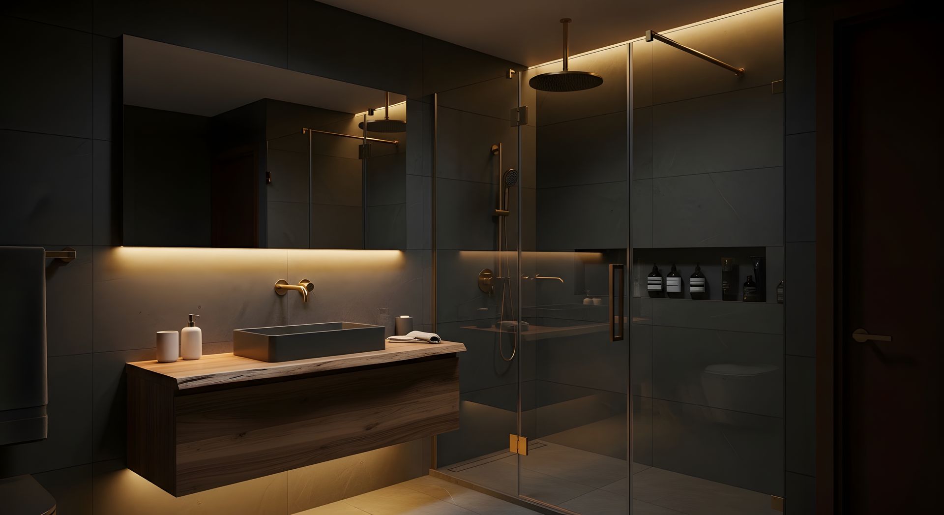Modern bathroom with a glass shower, wood vanity, and warm accent lighting.