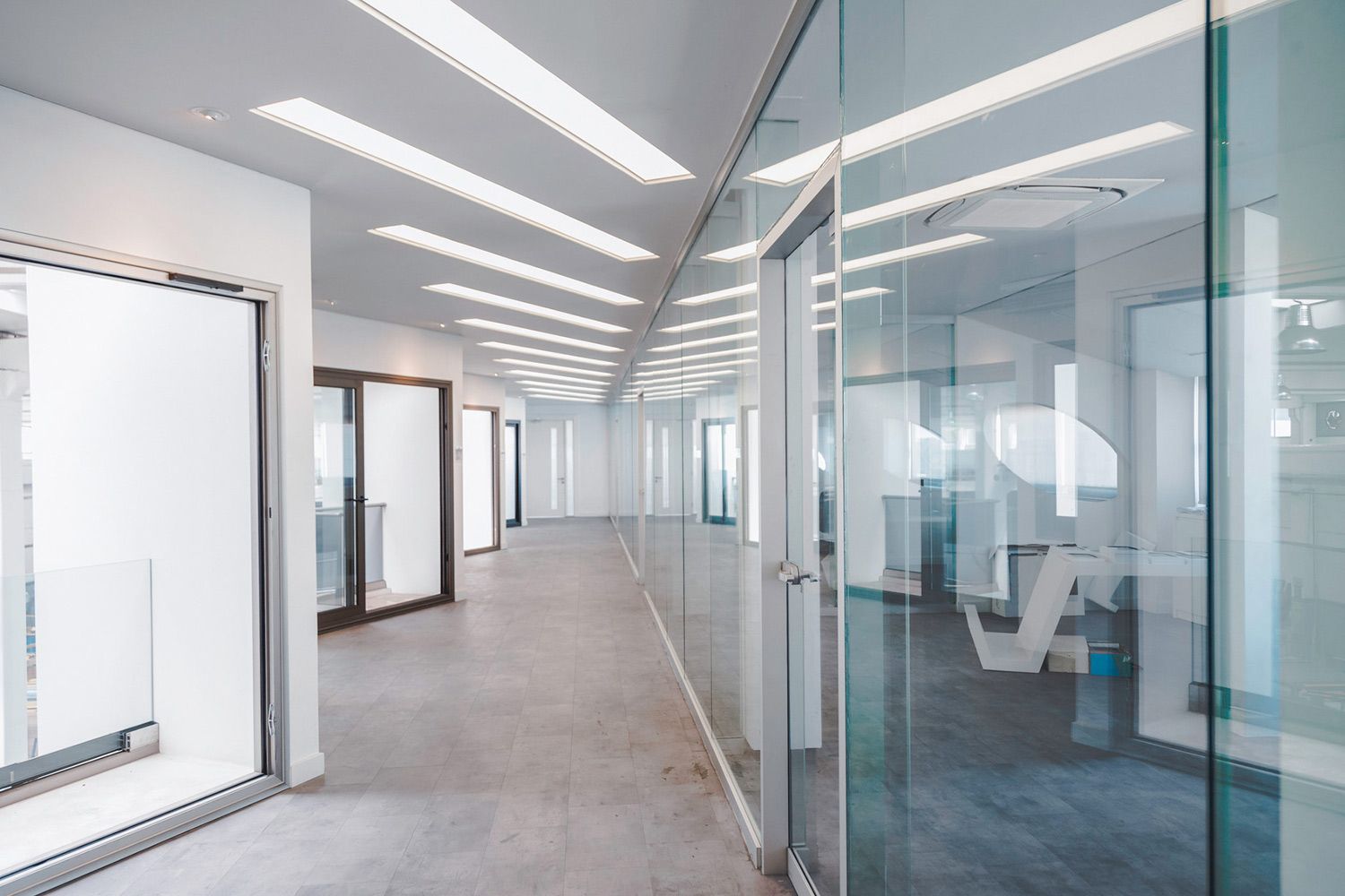 A Long Hallway with Glass Walls A Long Hallway with Glass Walls