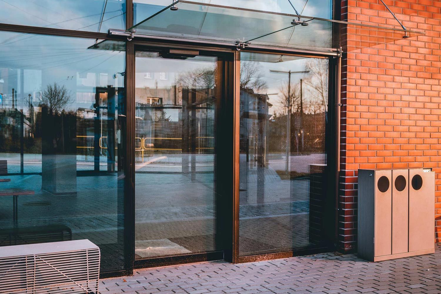 Glass Door and Brick Wall of a Store Glass Door and Brick Wall of a Store