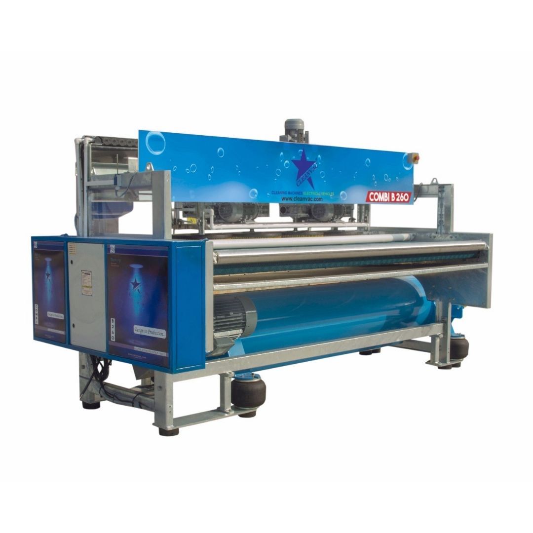 Blue and silver carpet cleaning machine with a large roller and overhead sprayers.