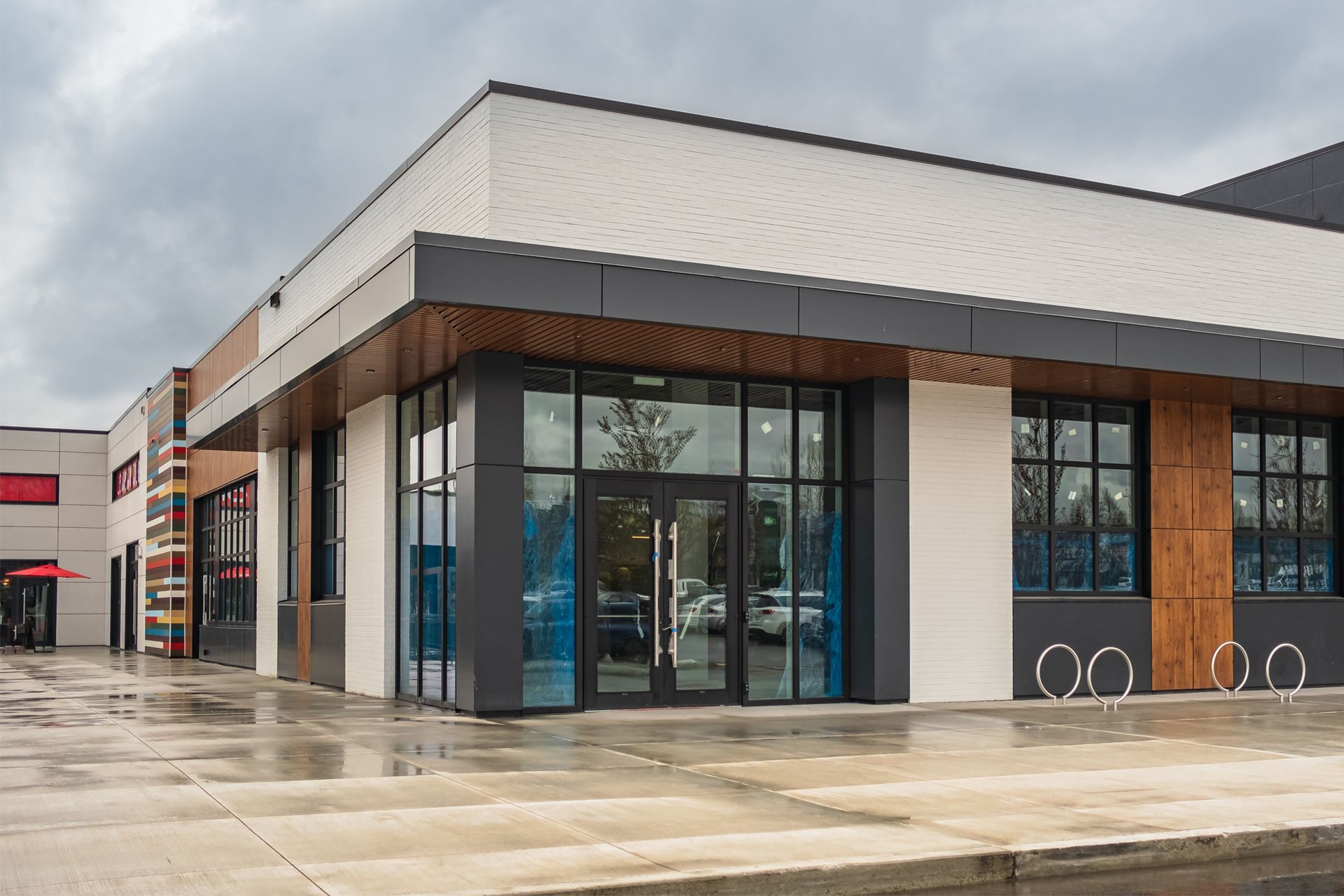 A large building with a lot of windows and a door
