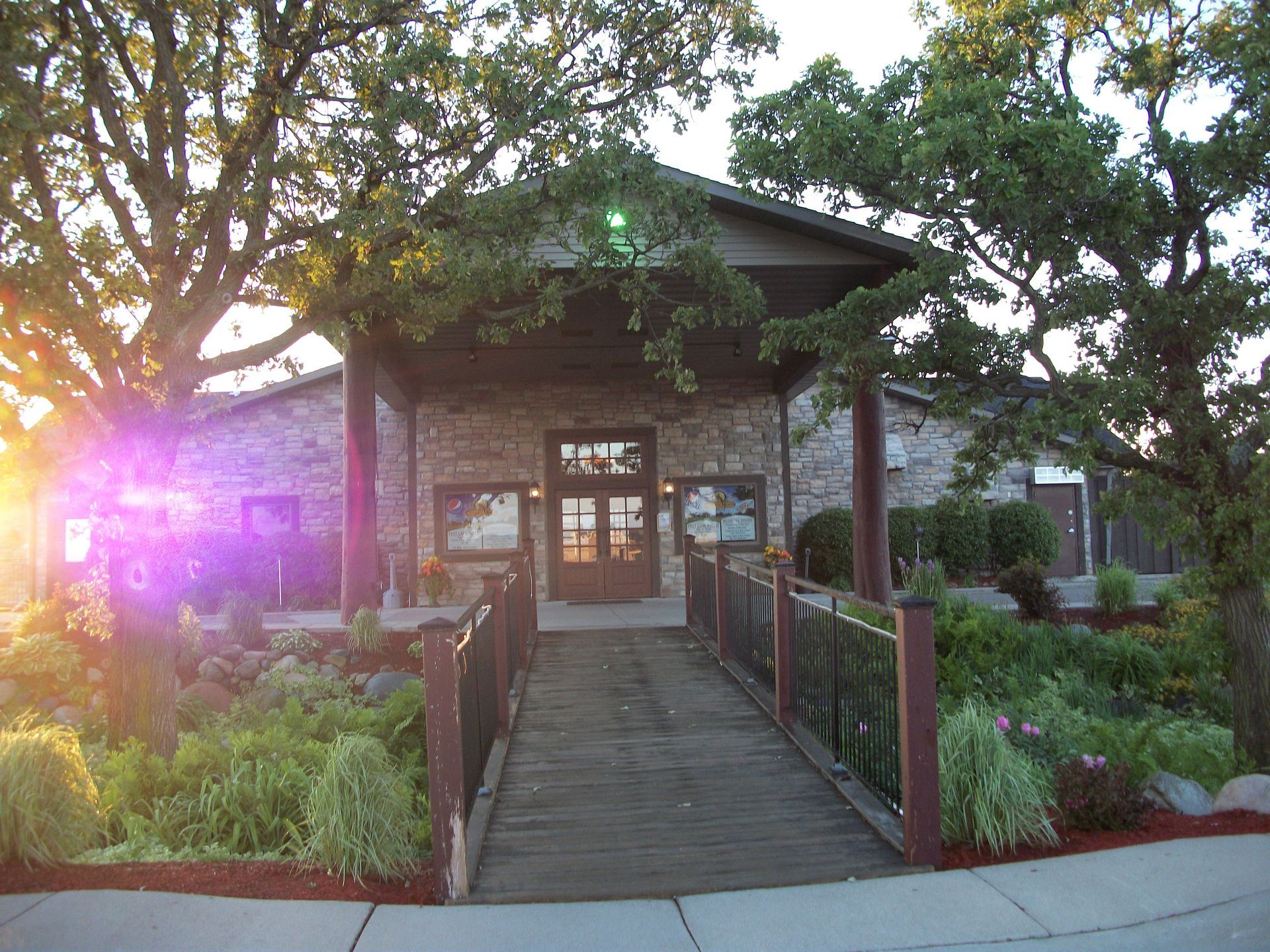 A building with a walkway leading to the entrance