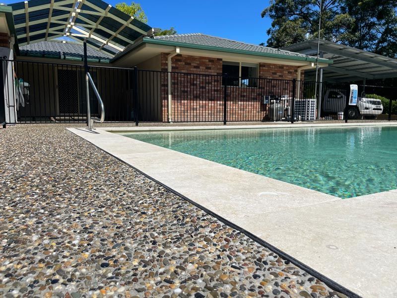 Close Up Pebble Concrete Installed — Brodie Wynter Concreting in Port Macquarie, NSW