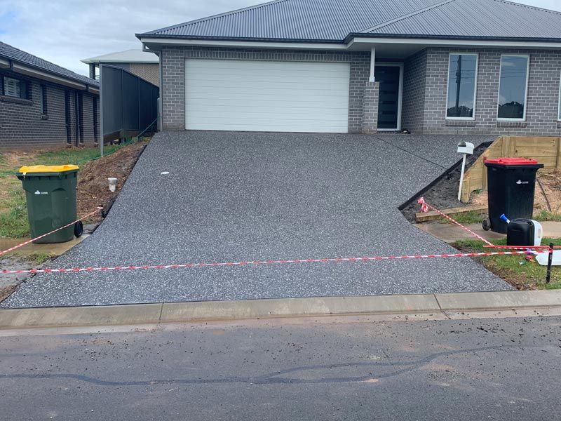 Driveway to Garage Residential — Brodie Wynter Concreting in Port Macquarie, NSW