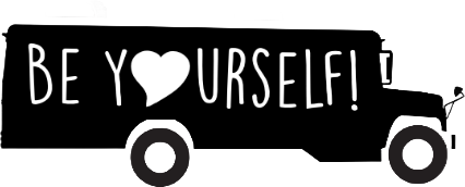 A black and white bus with the words `` be yourself '' written on it.