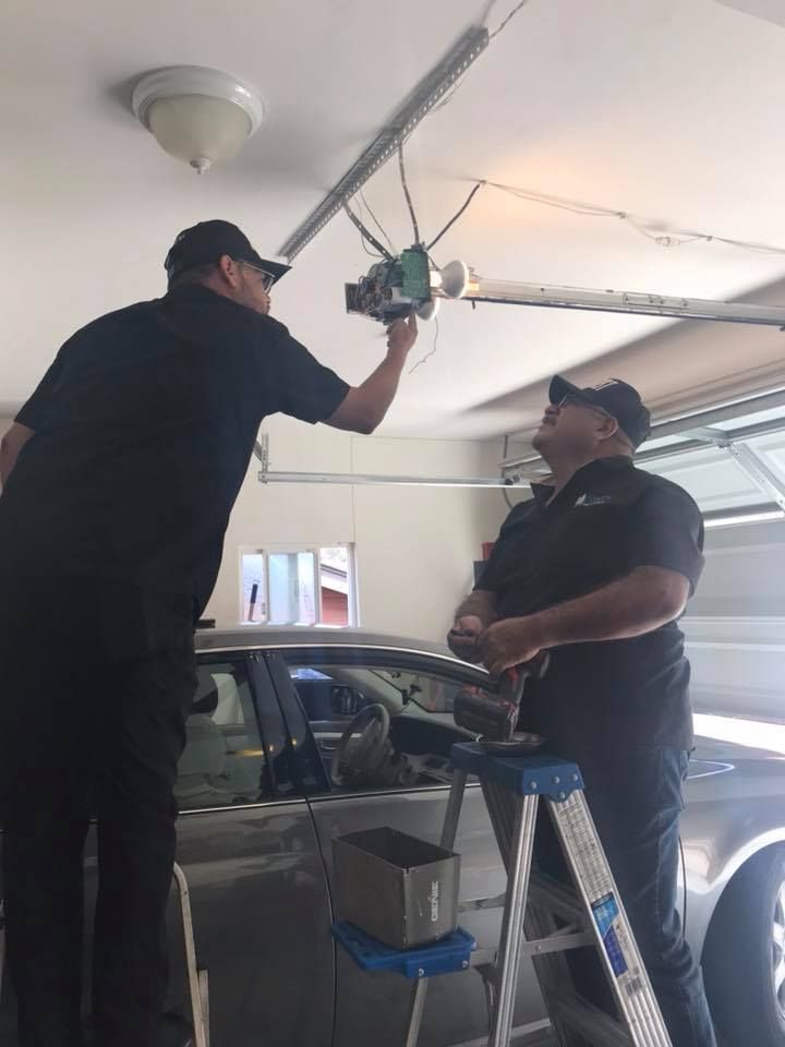 garage door 2 repairmen