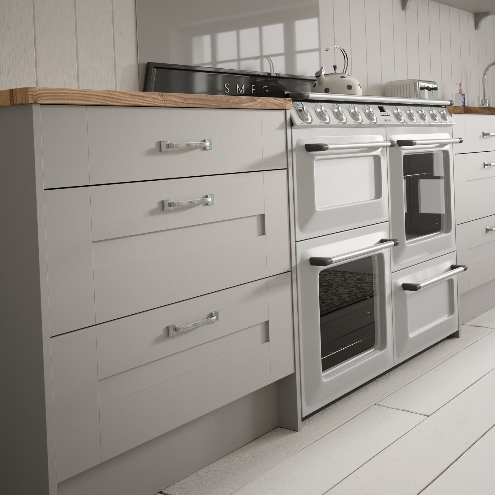 A kitchen with white cabinets and a white stove