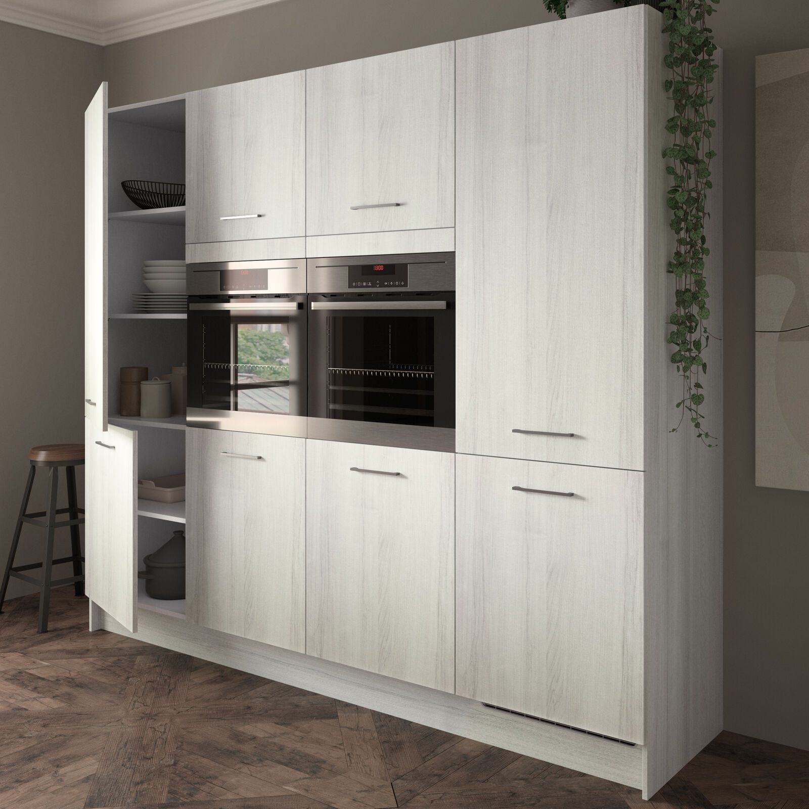 A kitchen with white cabinets and a stainless steel oven