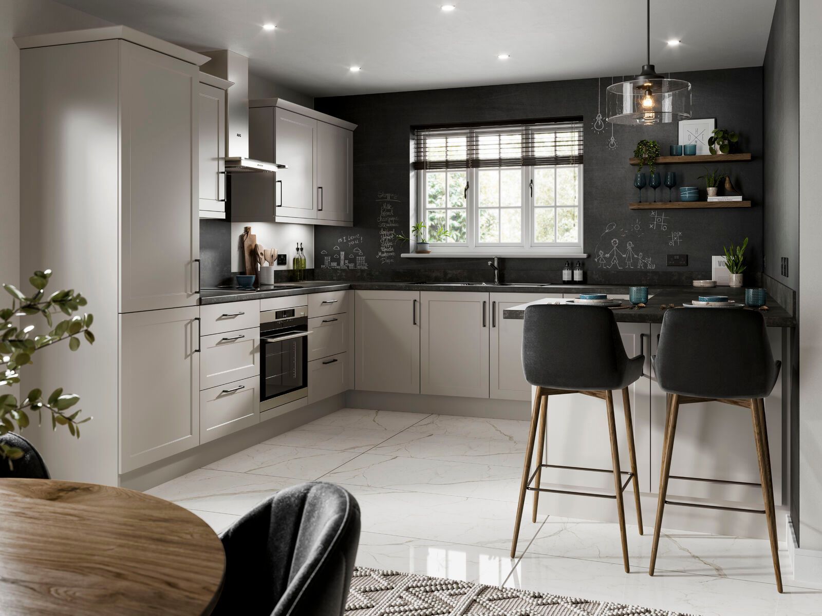 A kitchen with white cabinets , black walls , a table and chairs.