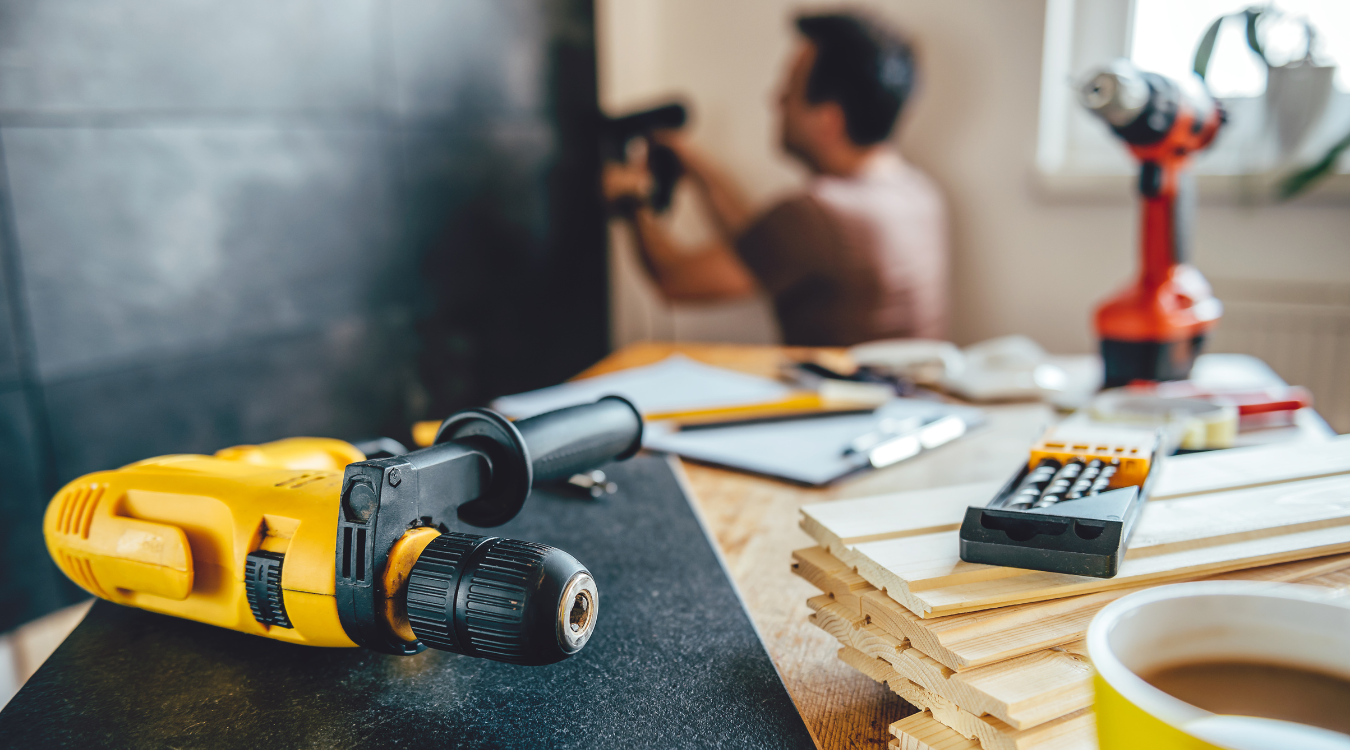 Tools on a table of a luxury kitchen remodel Builder at work in a luxury kitchen renovation