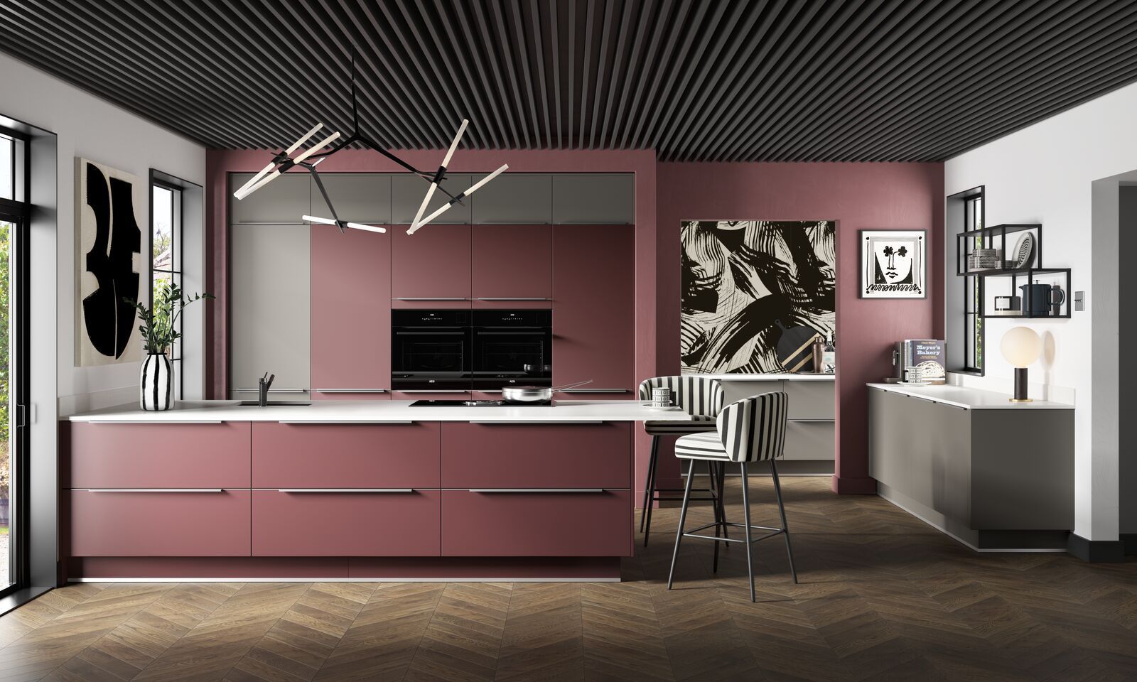 A kitchen with pink cabinets and a black ceiling