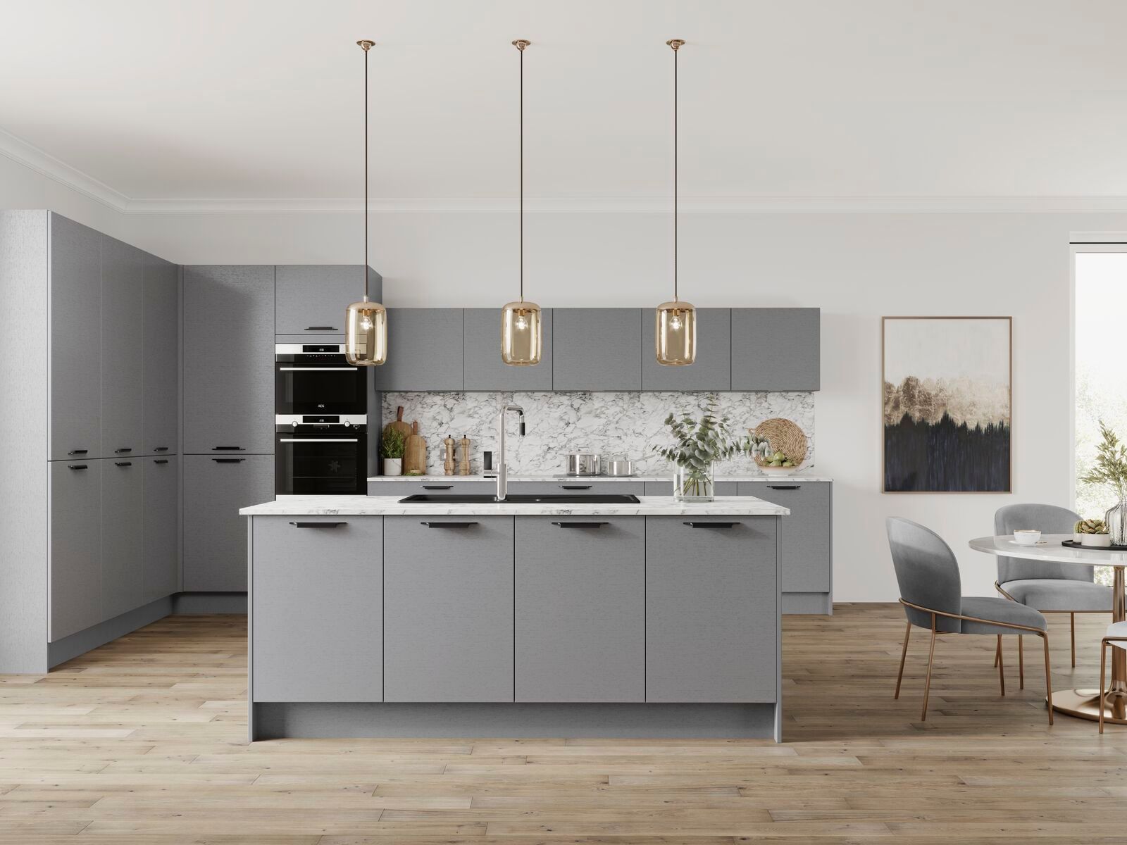 A kitchen with a large island in the middle and a dining room in the background.