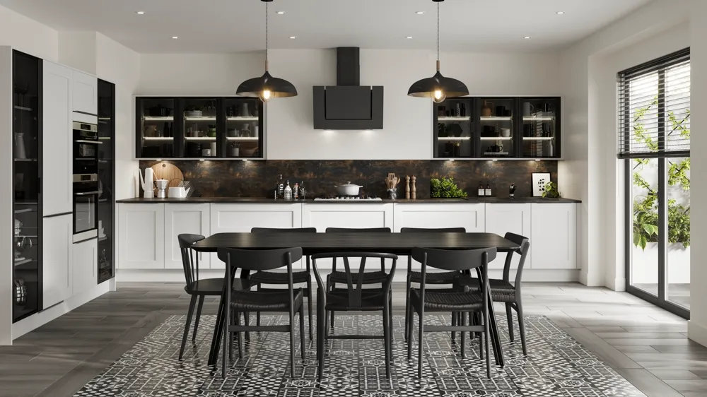 Modern black-and-white kitchen with island, pendant lights, open shelving, and patterned rug