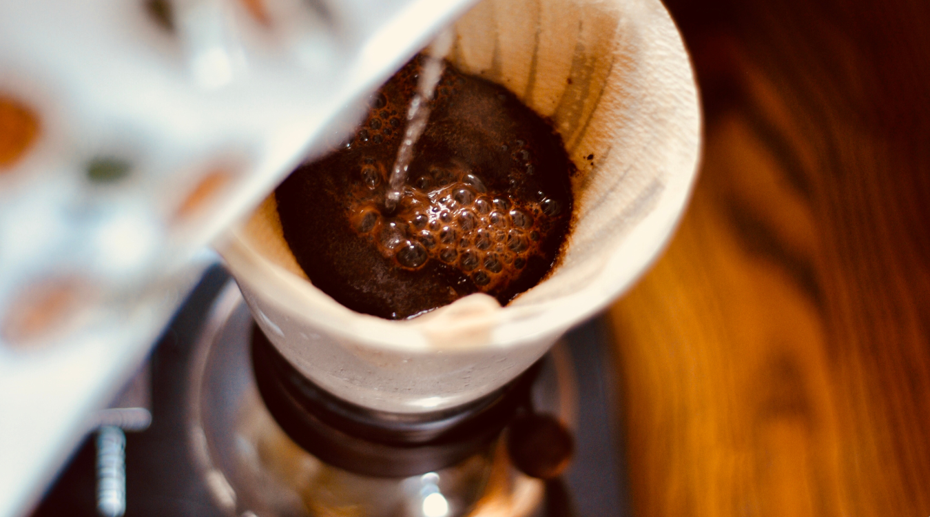 Freshly ground coffee being brewed