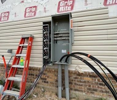 Technician Installing Power Outlet — Terrell, TX — Lumpy's Electric
