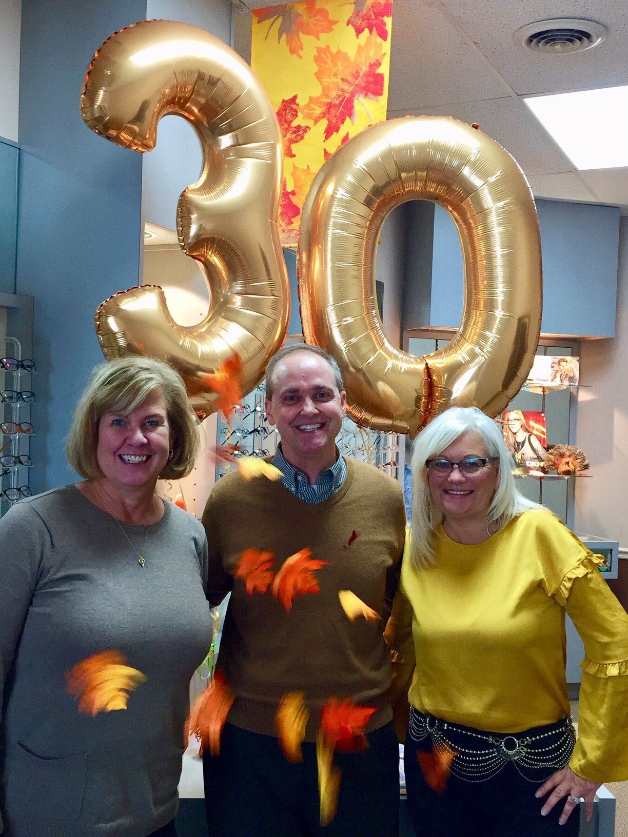 woman choosing spectacles