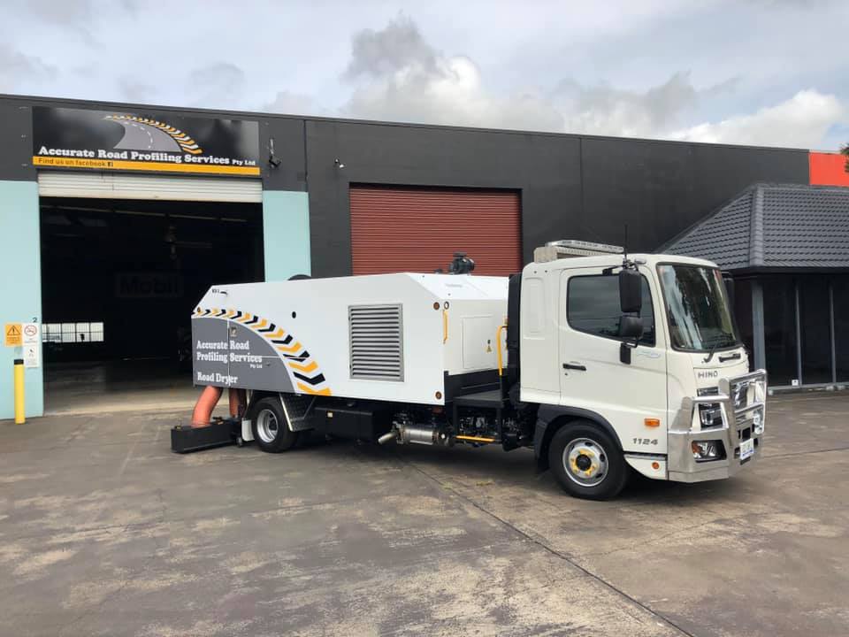 Road Dryer Truck Outside The Garage — Road Profiling in Caboolture, QLD