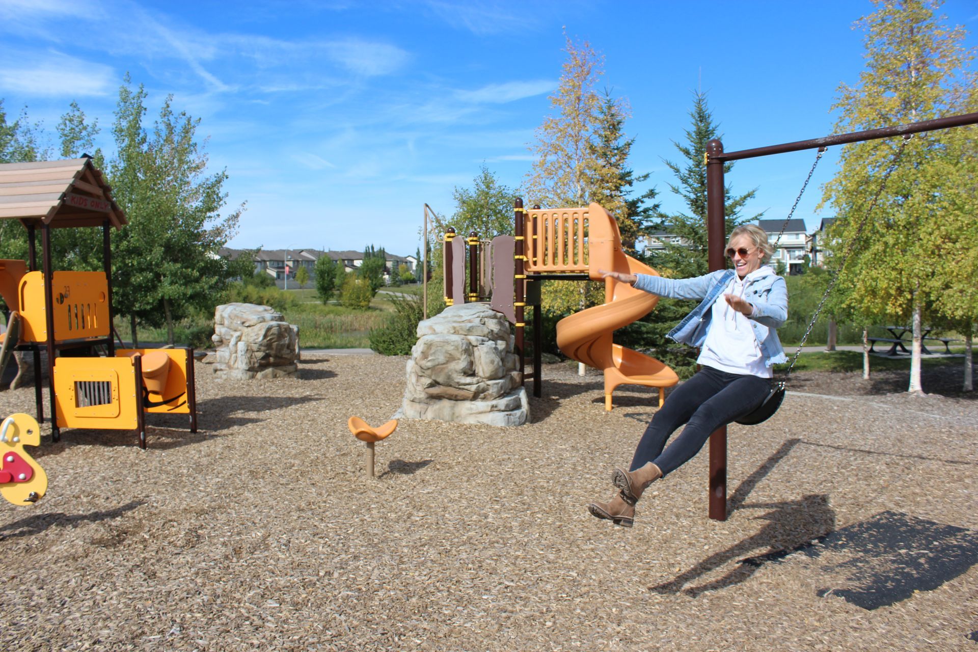 Jumping off the swing at sunset ridge park