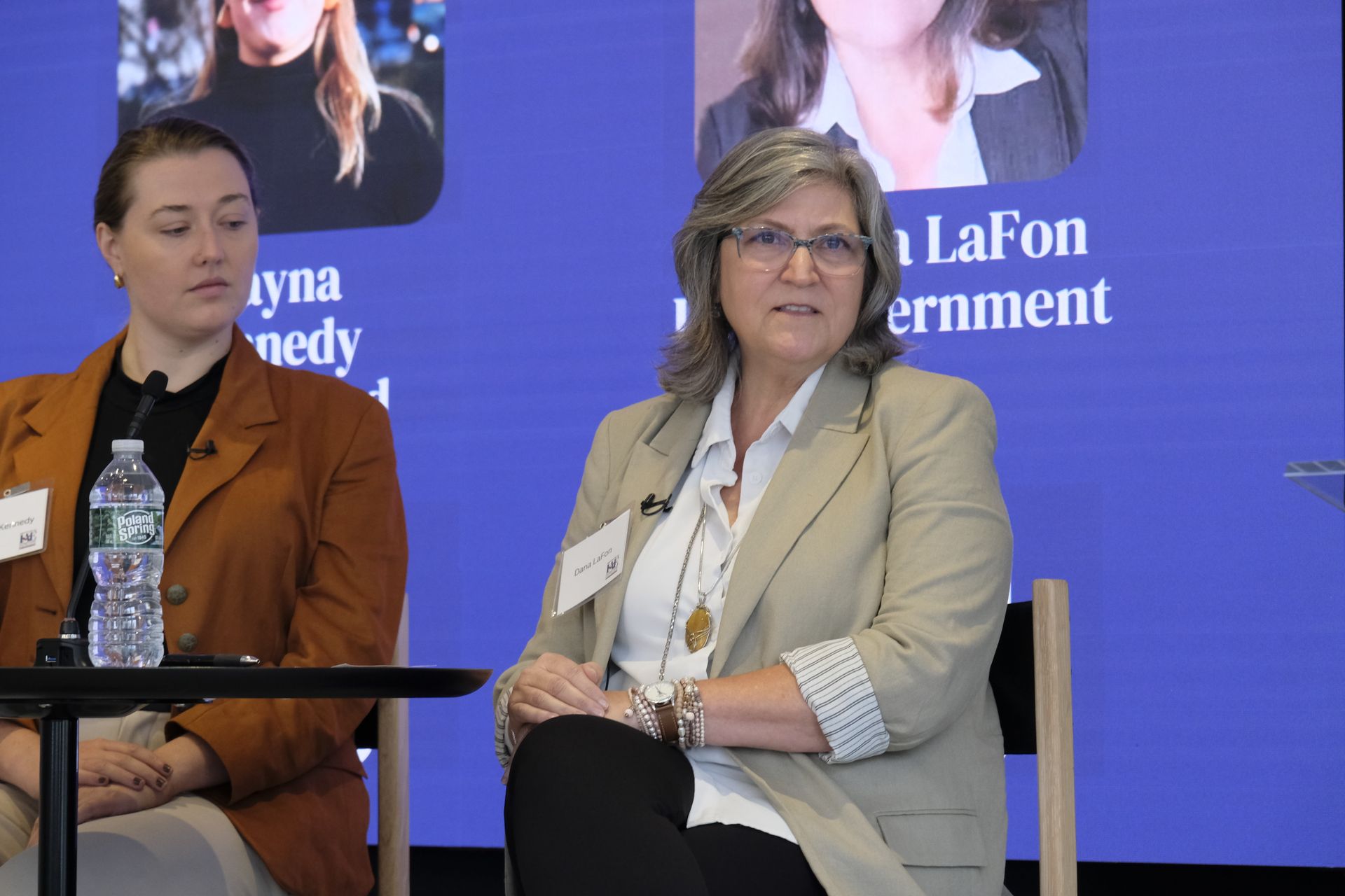 Photo of Dr. Dana LaFon speaking and Alayna Kennedy listening.
