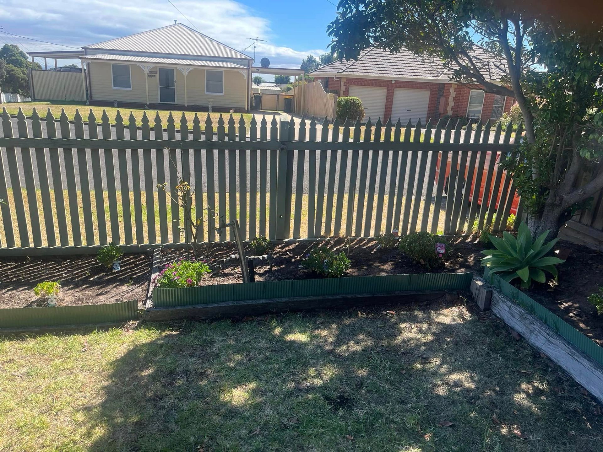 There is a Gazebo in the Backyard With a Table — RJT Lawn and Gardening in Drysdale, VIC
