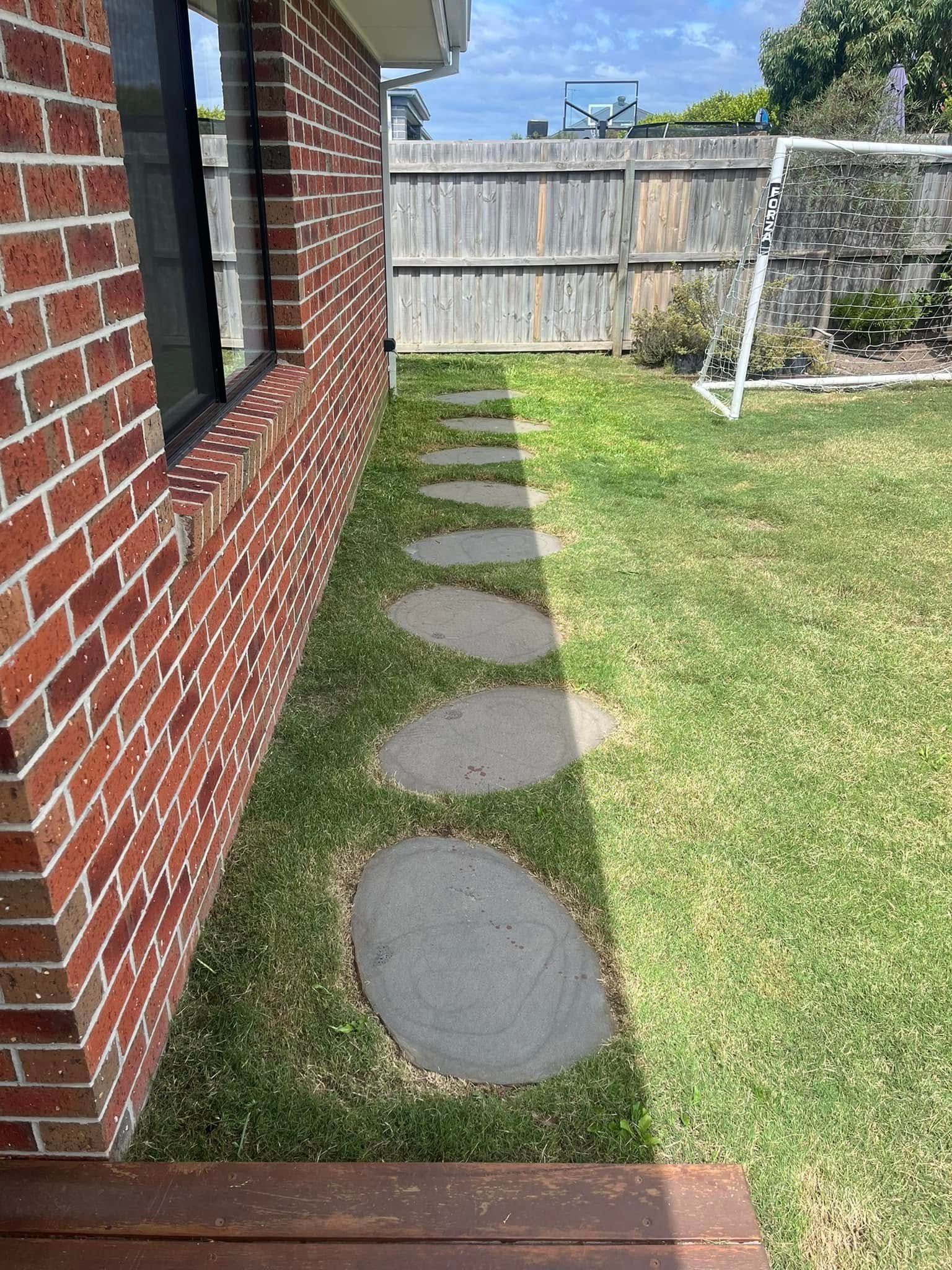 A Backyard With Concrete Steps — RJT Lawn and Gardening in Leopold, VIC