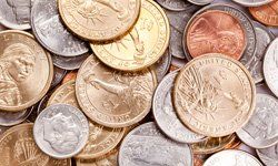 There are many different types of coins in this pile.