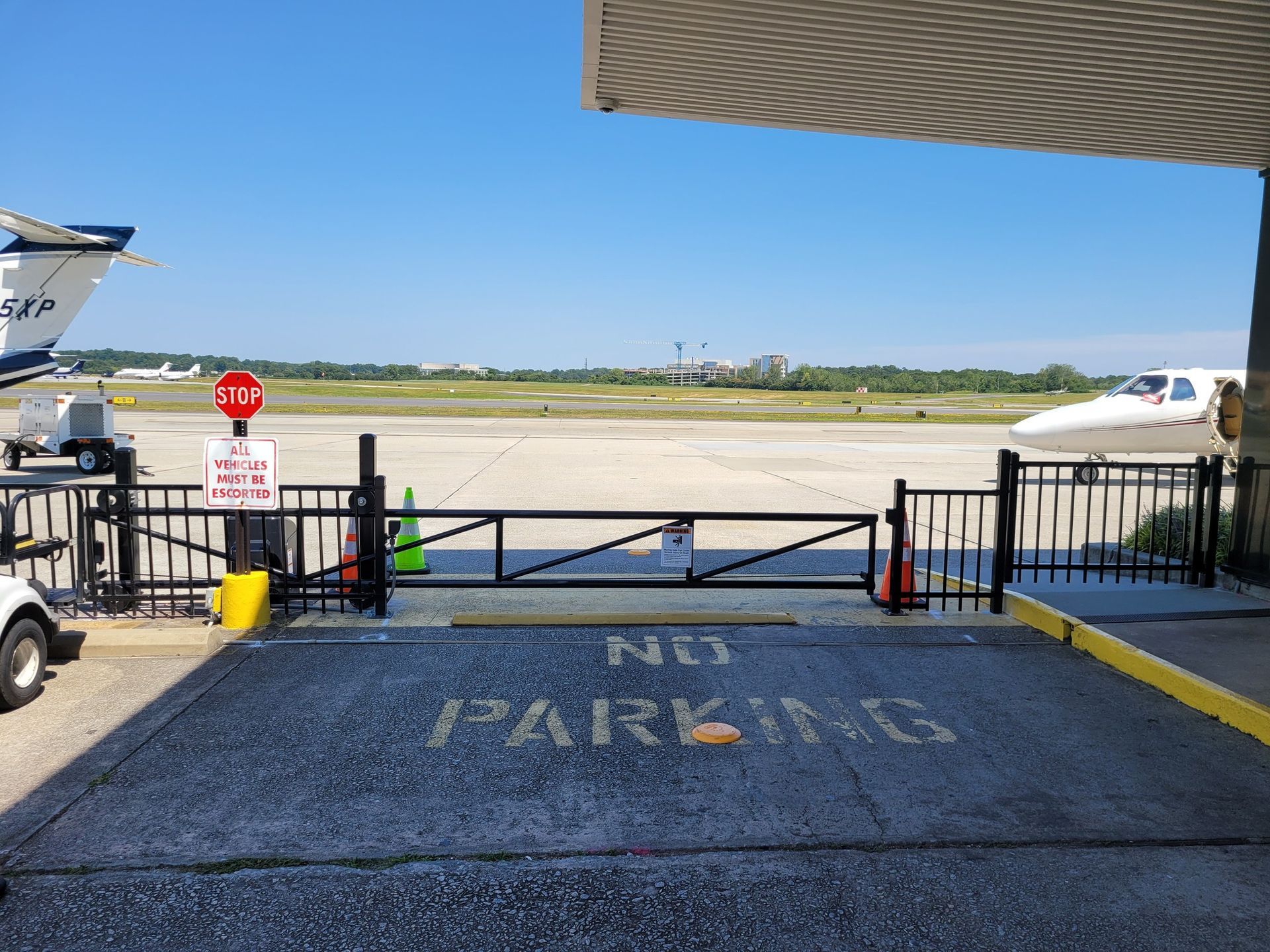 Black gate at an airport, with 