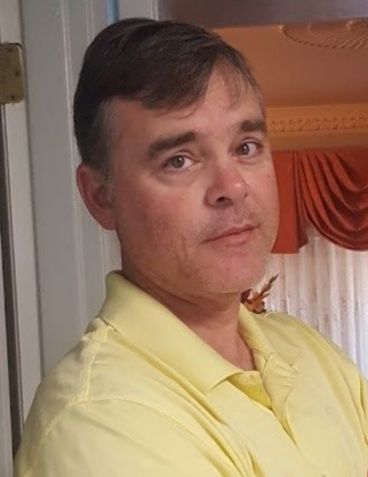 Ants swarming a light-colored, syrupy substance on a white tile floor.