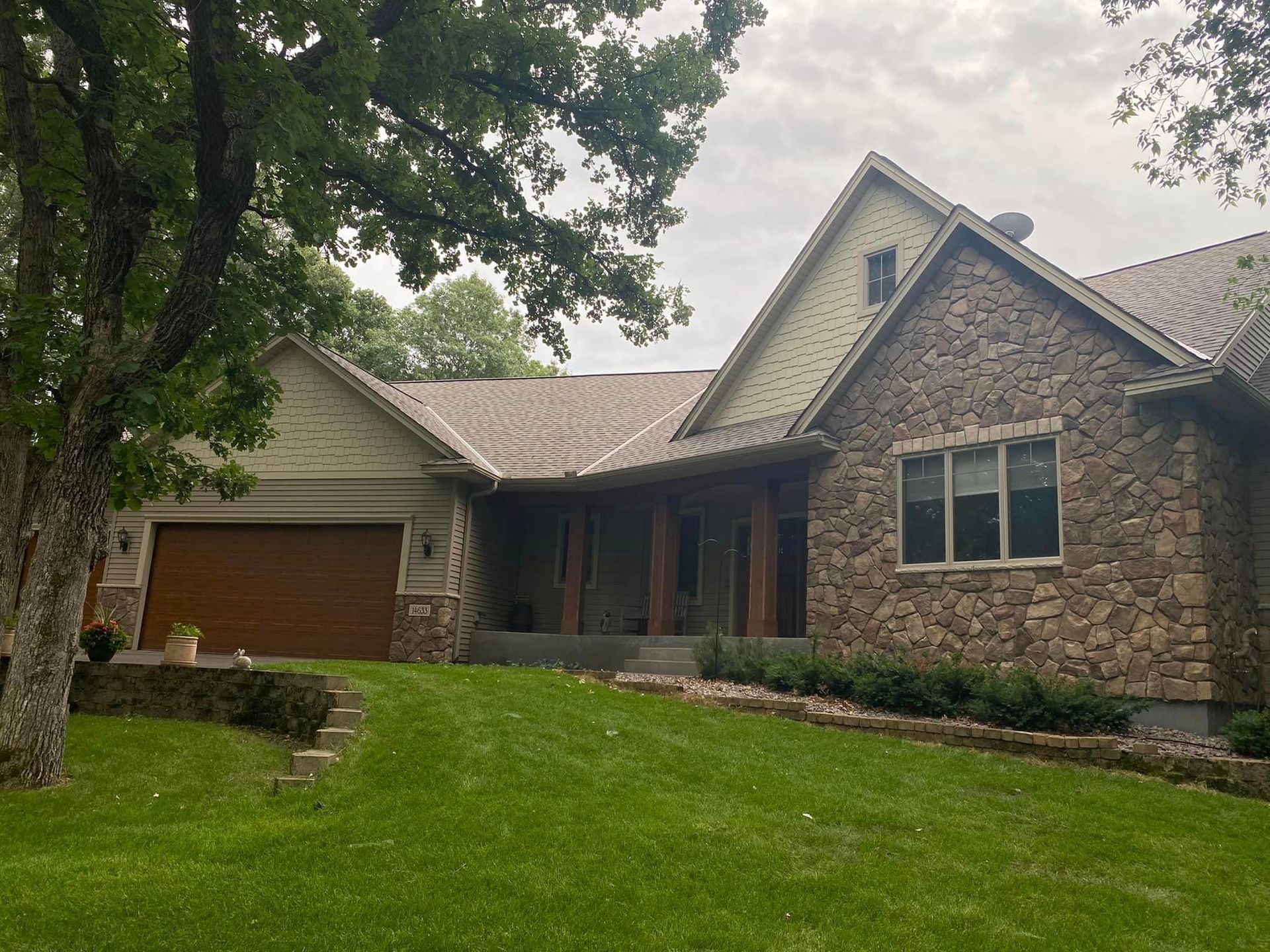 A large house with a large lawn in front of it