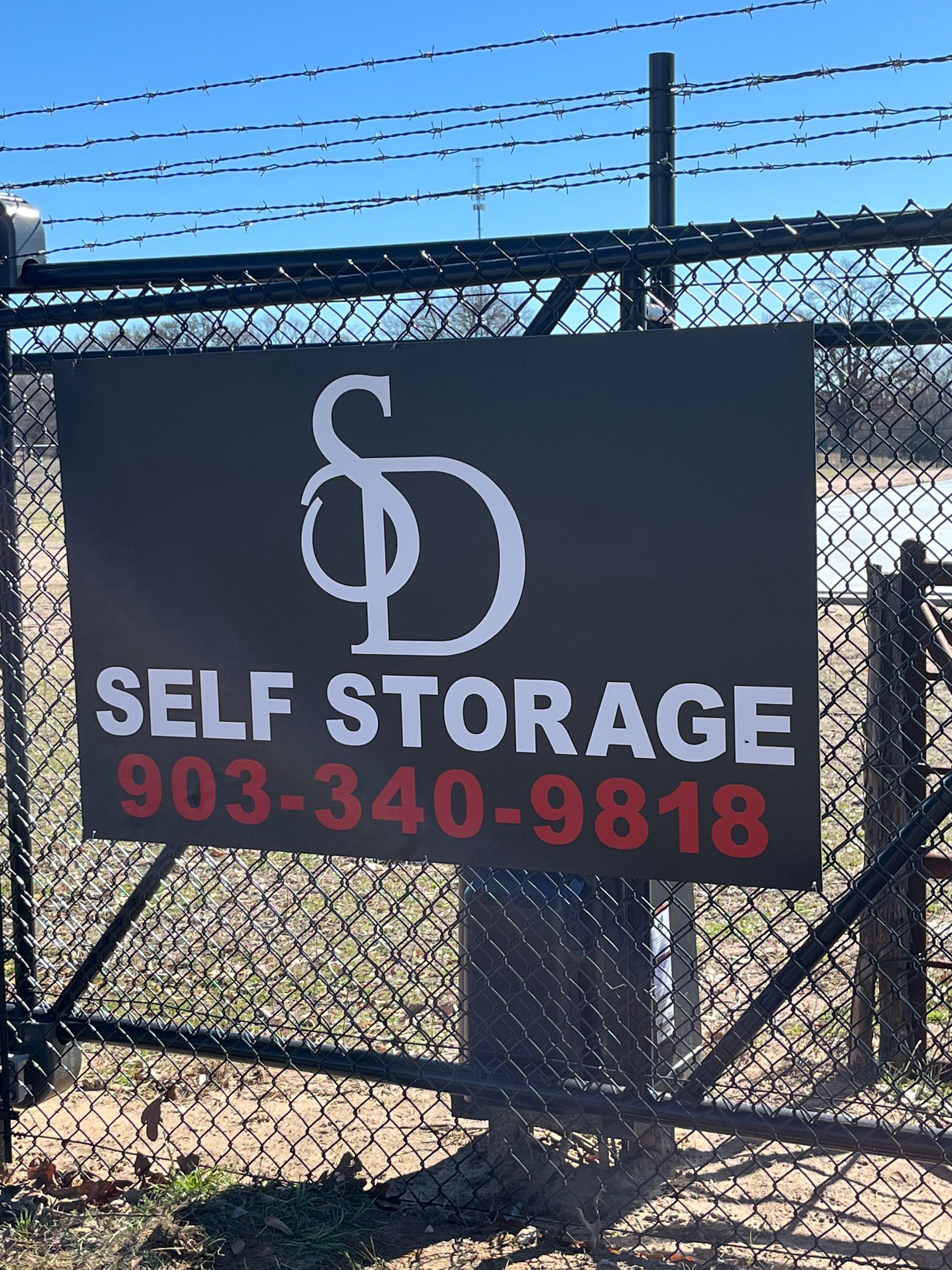 Black sign with white 