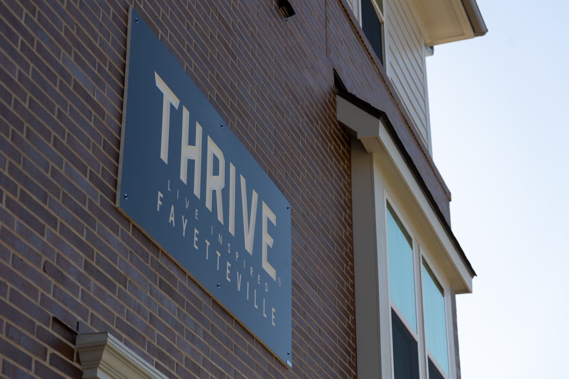 thrive sign
