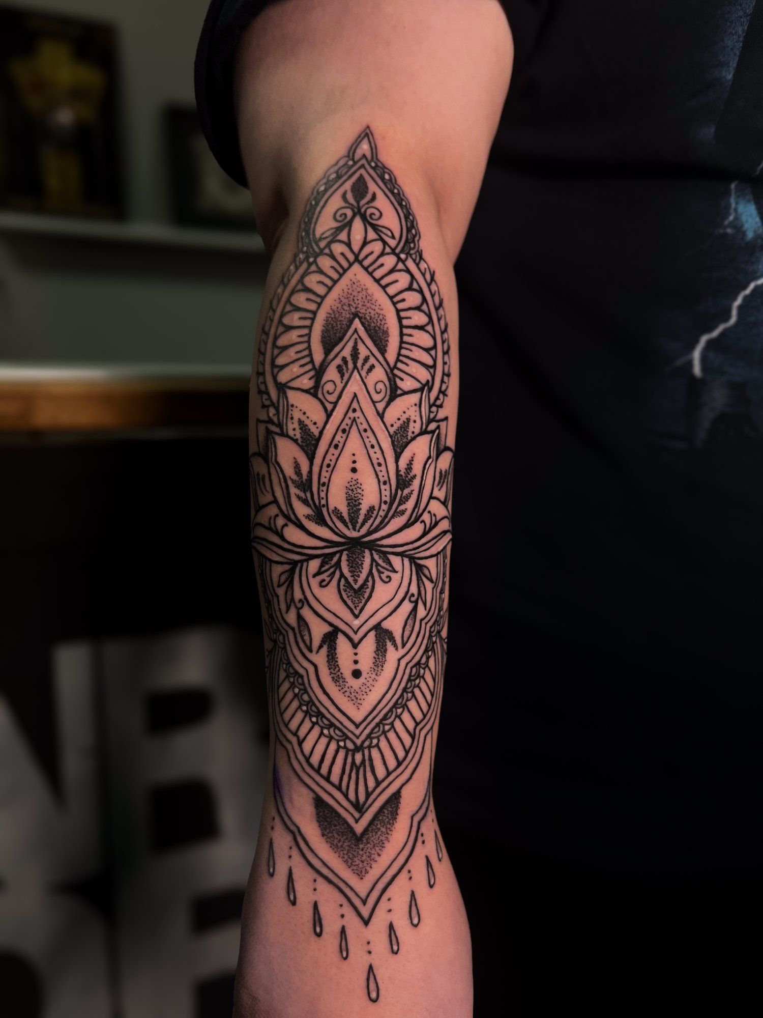 A close up of a tattoo on a person 's arm.