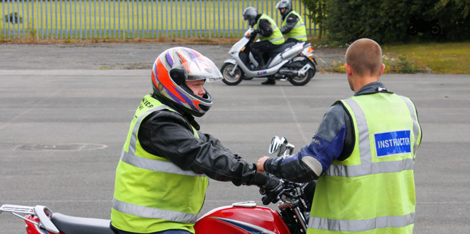 Motorcycle instructor and pupil