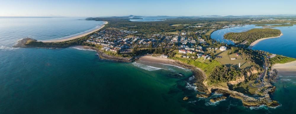 An Aerial View of a Small Island in the Middle of the Ocean — D’Art Interiors in Yamba, NSW