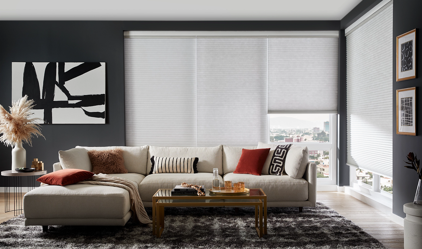 A living room with a sectional couch and a coffee table.