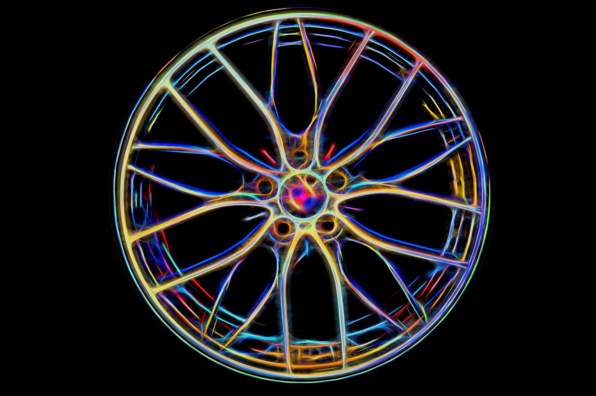 Eine Nahaufnahme eines Autorads mit roten Bremssätteln