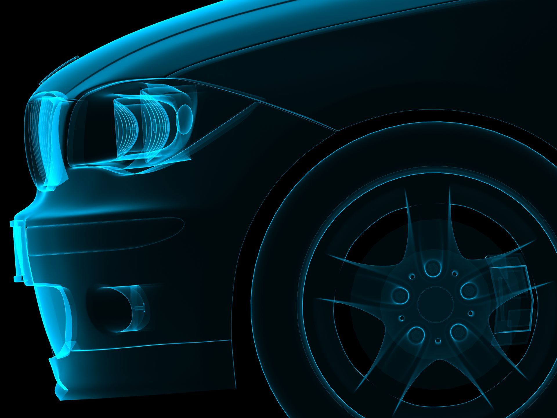 Ein schwarzer Audi A4 parkt vor einer Betonmauer.