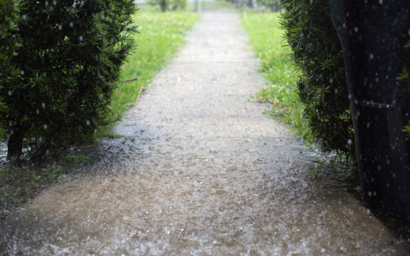 Flooded walkway with rain water