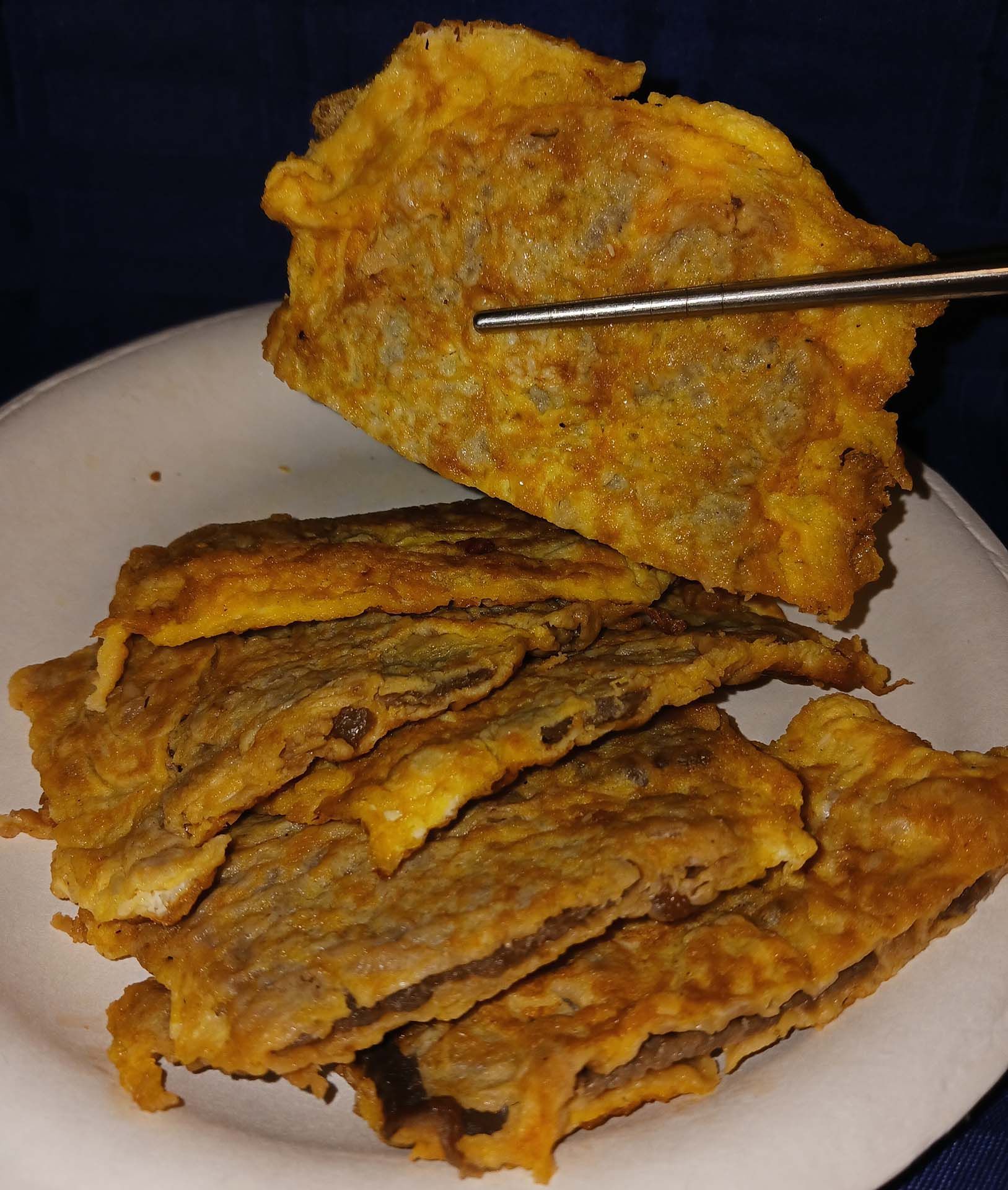 Korean pancake on a white plate
