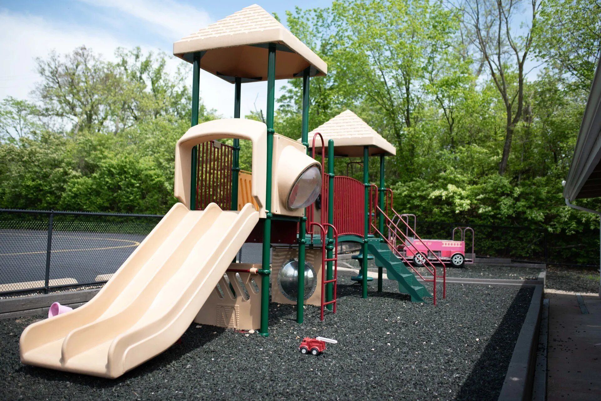 Front play area with multiple slides