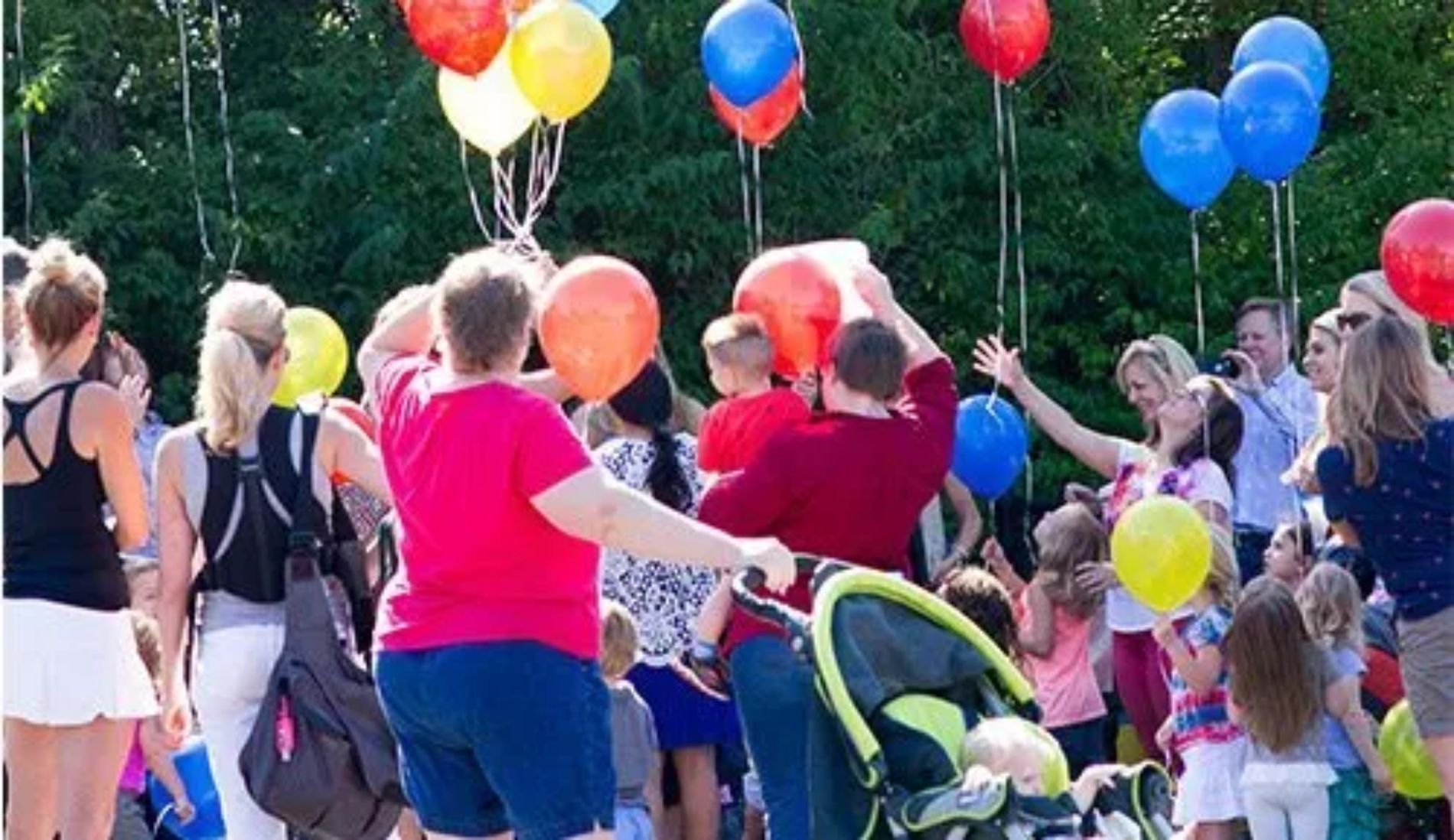 Group of people with balloons