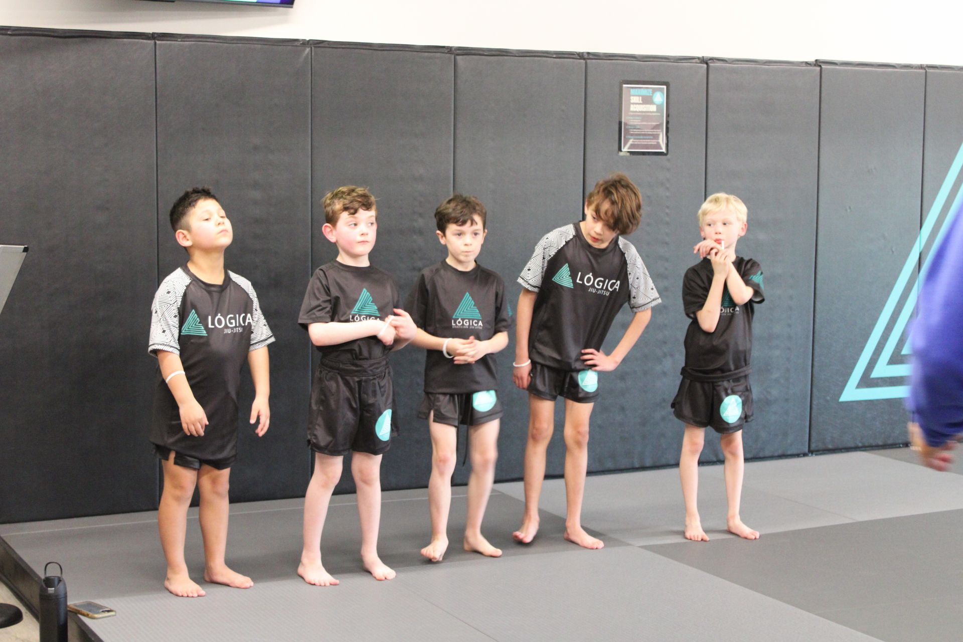 Students practice controlled grappling at Lógica Brazilian Jiu-Jitsu in Chattanooga, TN.