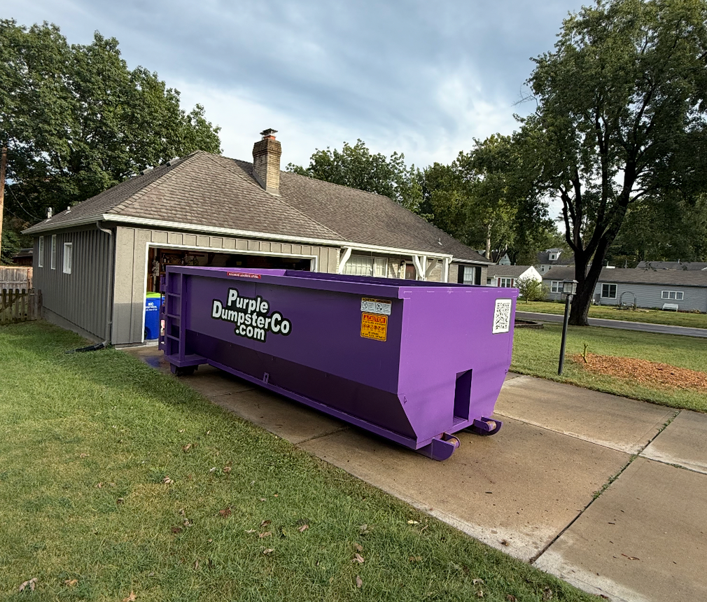 Purple Dumpster Co. truck