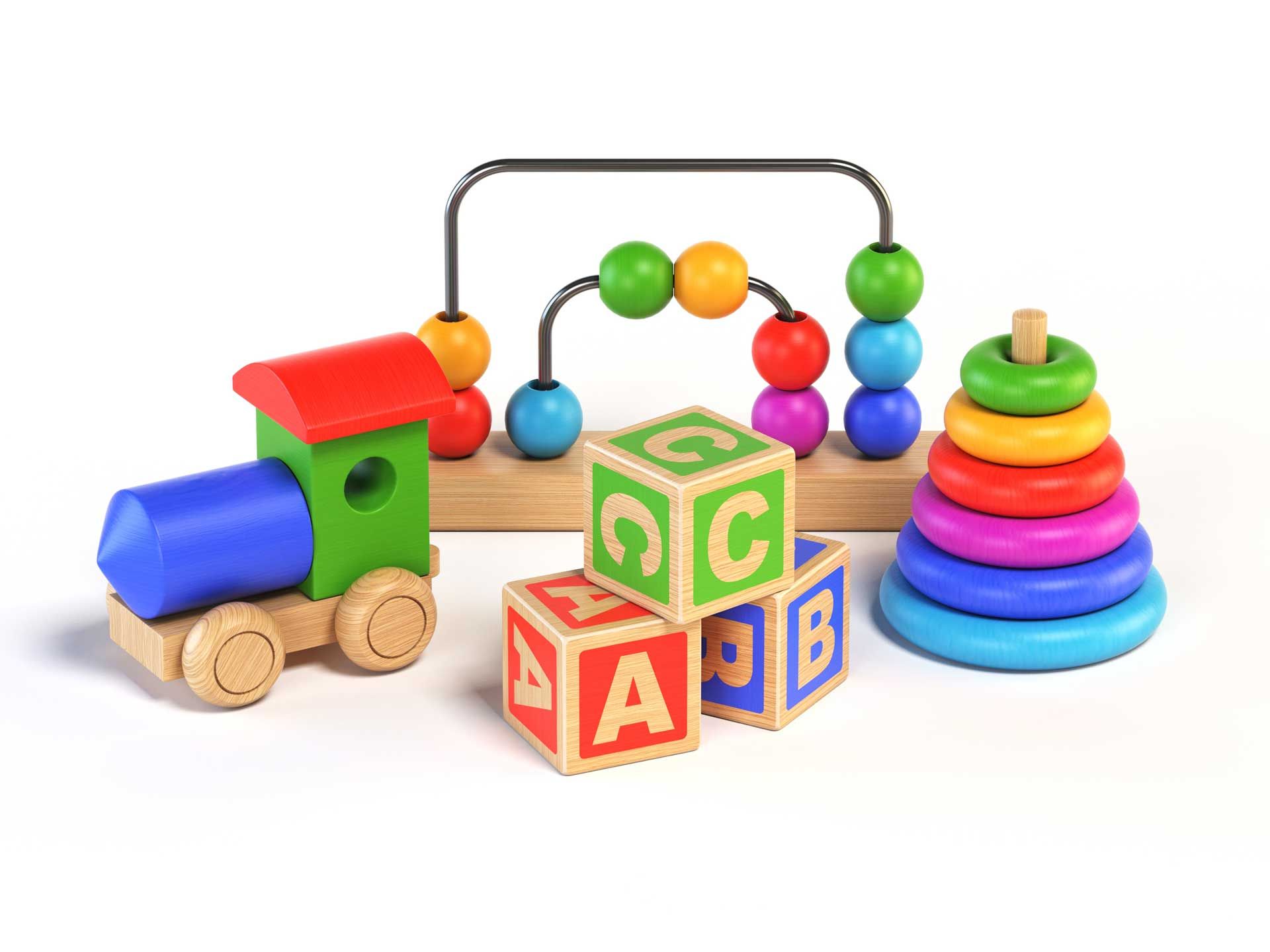 A wooden train , abacus , stacking rings , and wooden blocks.